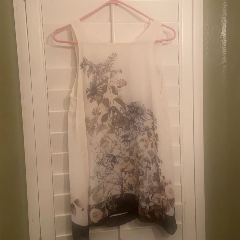 Flower print blouse.